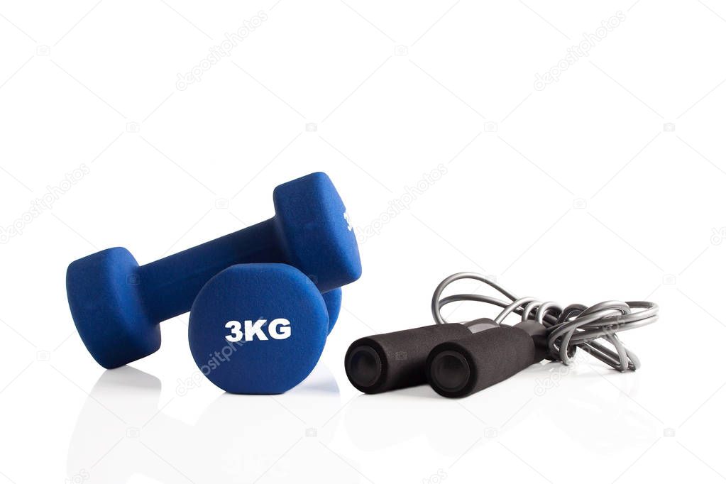 Blue 3kg dumbbells and a skipping rope for fitness training.