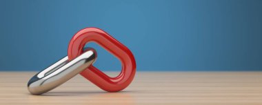 Takım çalışması konsepti. Ahşap zemin üzerinde iki metalik zincir halkası.