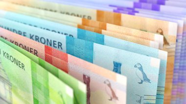 Norveç kron parasının çeşitli canlı banknotlar sergilendiği yakın plan çekimleri.