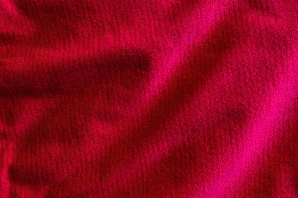 皱皱的红棉织物 免版税图库照片