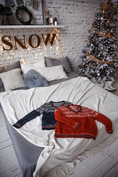 Two Winter Sweaters Laid Bed Loft Background Brick Wall Next — Stock Photo, Image