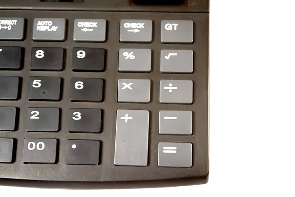 Black digital calculator on the top view white background — Stock Photo, Image