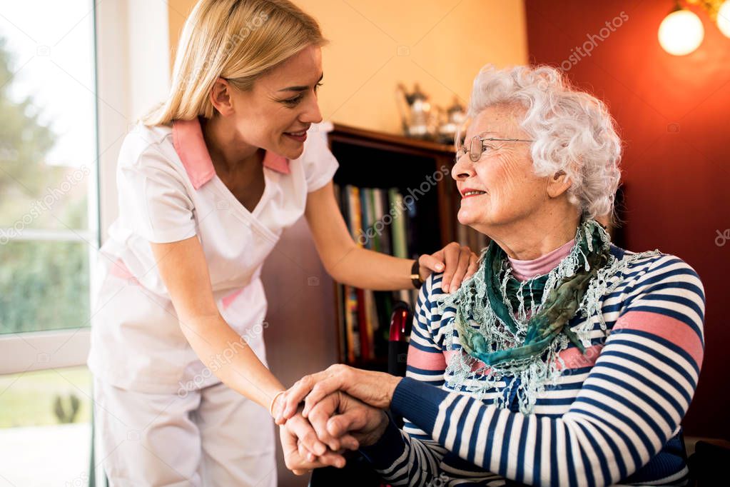 Professional home treatment, nurse visit her senior patient at home