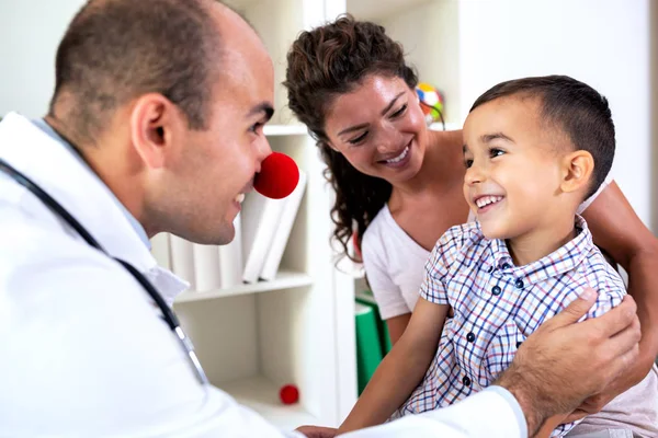 Funny Doctor Entertaining Little Kid While Wearing Clown Nose — Stock Photo, Image