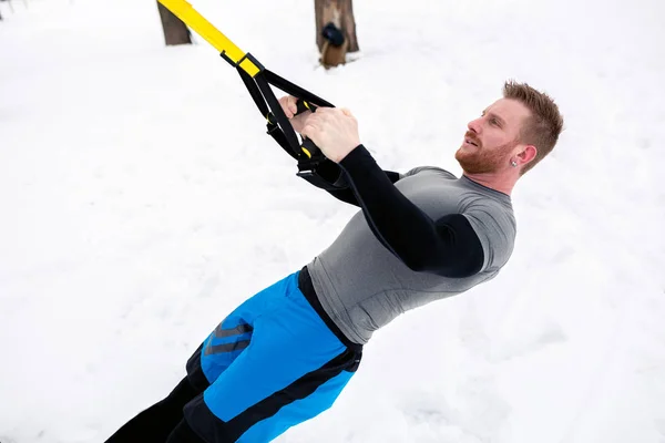 Outdoor winter exercises for building of a rock-solid body core