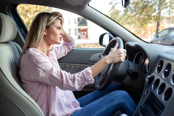 Angry driver losing her temper being more and more upset
