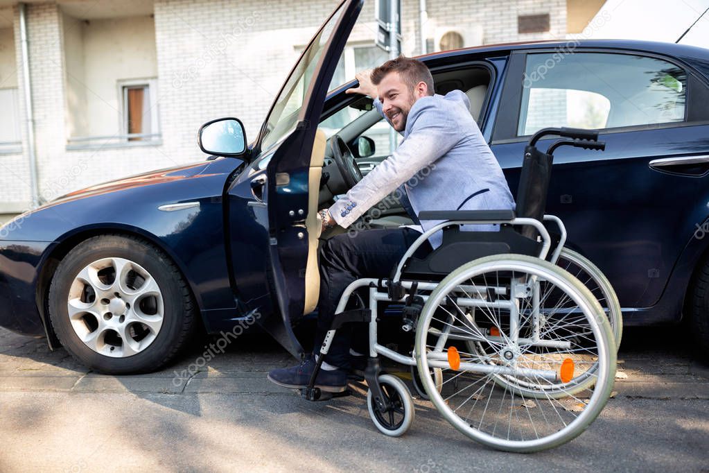 Guy reaching for the driver spot 