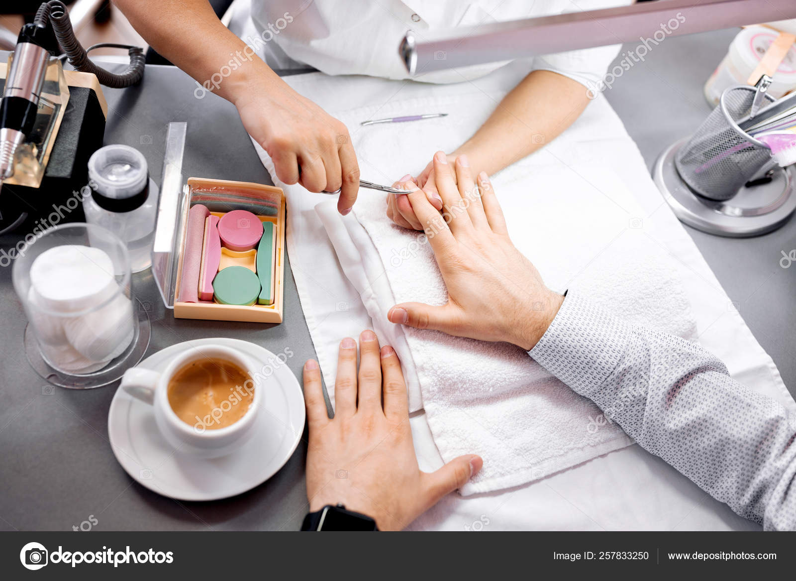Cutting of stubborn cuticles with scissors Stock Photo by ©didesign