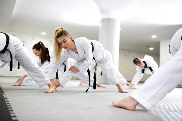 Sports and para-sports athletes training martial art of taekwond