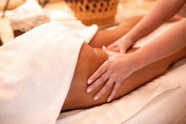 Sexy ass massage in spa, concept of cellulite reduction