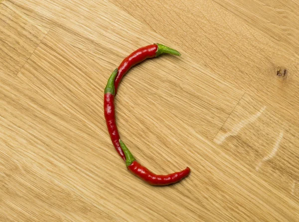 Food letters made from freshly picked chilli peppers