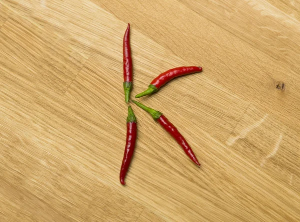 Food letters made from freshly picked chilli peppers