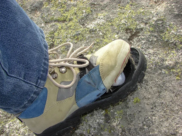 Damaged hiking boot