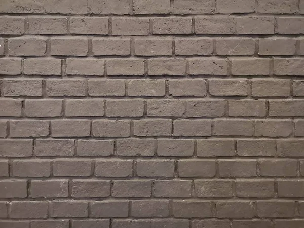 Brick wall black color paint rough surface material pattern block background