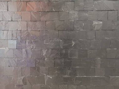 siyah taş yığın blok kare tuğla duvar pürüzlü yüzey doku malzemesi arka plan