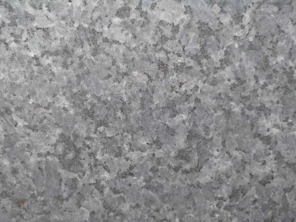 Granite granitoids surface rough fine sand finished wall, floor material black and gray color background, Always has a tight texture, durable