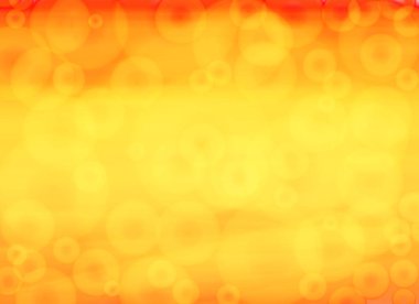 Sarı daire Bokeh 'in turuncu parlak arka planda ampul almasından.