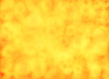 Sarı daire Bokeh 'in turuncu parlak arka planda ampul almasından.