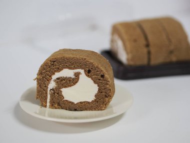 Yam Roll kahvesi ve kremayla doldurulmuş yumuşak ekmek.