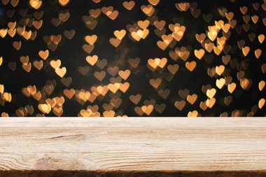 Perspektif ahşap zemin kahverengi renk doku ile bulanıklık güzel bokeh arka plan kavramı ürün montaj mockup için düzenli Noel.