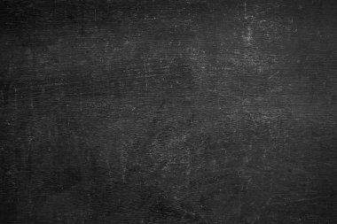 Kolej konseptinde beyaz tebeşir çizimi grafiği oluşturmak için okul çağındaki çocuk duvar kâğıdına geri dönüş konseptindeki boş ön siyah yazı tahtası dokusu. Boş eski duvar eğitimi tahtası.