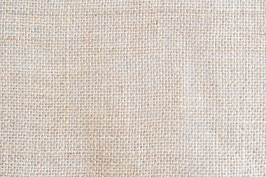 Geri kahverengi kumaş bez doku arka plan metin tasarım için boş alan ile. Temiz sarı bej Hessian çul Yün dokuma pli kavramı krem çuval desen rengi, retro düz pamuk kumaş.