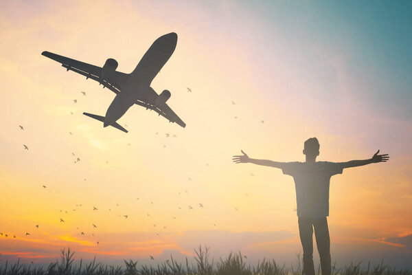 Happy passenger man stand on runway airport look air plane concept for tourism vacation flight delay weekend holiday trip, people jet lag in transportation, good insurance business relax guide tour
