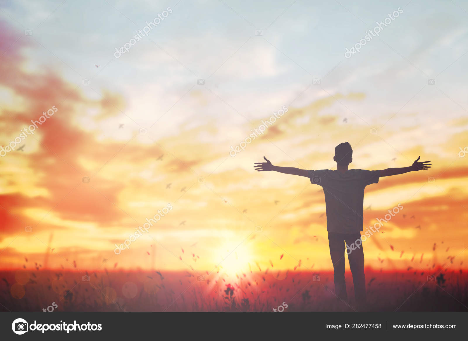 Happy man rise hand on morning view. Christian inspire praise God on good friday background. self confidence empowerment on mission arm courage nature the sun concept strength wisdom Stock Photo by ©