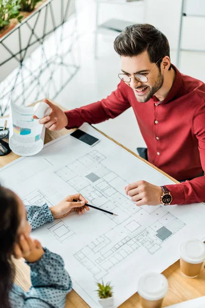 Couple Architects Sitting Table Working Blueprints Office — Stock Photo, Image