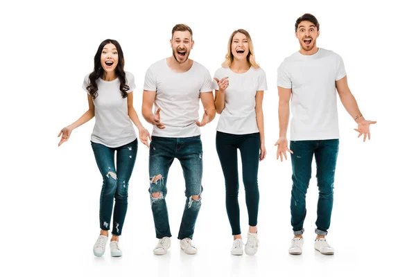 shocked young people screaming and looking at camera isolated on white