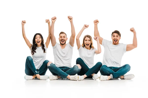 Excited Young Friends White Shirts Sitting Raising Hands Isolated White — Stock Photo, Image