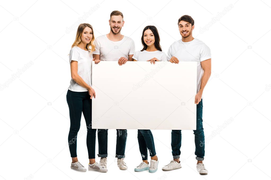 happy young people holding blank placard and smiling at camera isolated on white 