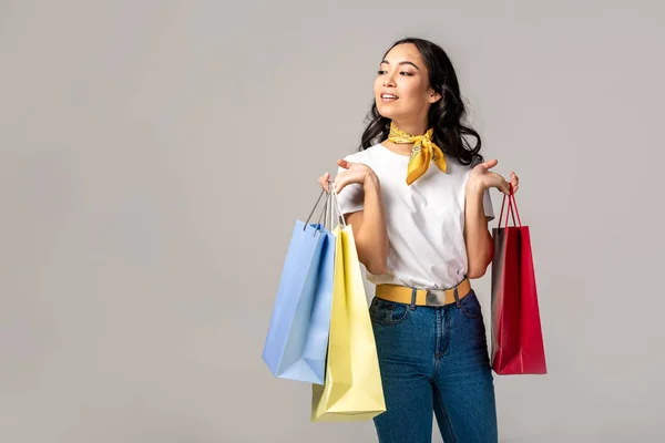 Happy Young Asian Woman Holding Colorful Shopping Bags Raised Hands — Stock Photo, Image