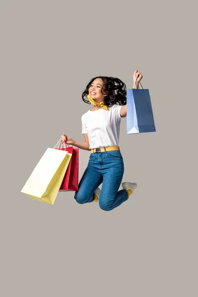 Excited Asian Woman Holding Colorful Shopping Bags Happily Jumping One — Stock Photo, Image