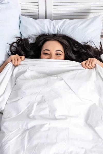 Young Beautiful Asian Woman Laughing While Looking Out Blanket — Stock Photo, Image