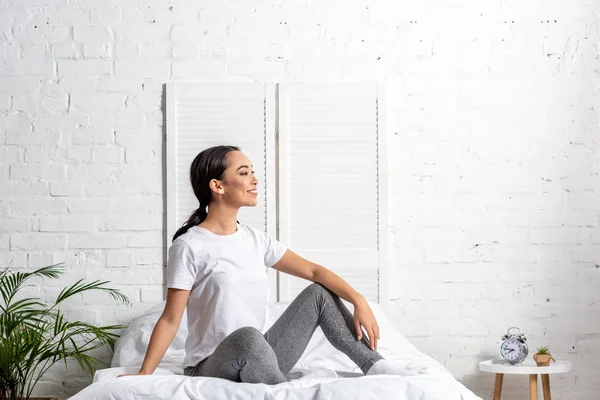 Asian Woman White Shirt Grey Leggings Sitting Bed Resting Morning — Stock Photo, Image