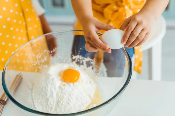 Cropped View Kid Adding Eggs Flour Glass Bowl — Stock Photo, Image