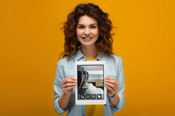 Happy Redhead Woman Holding Digital Tablet Tickets App Screen While — Stock Photo, Image