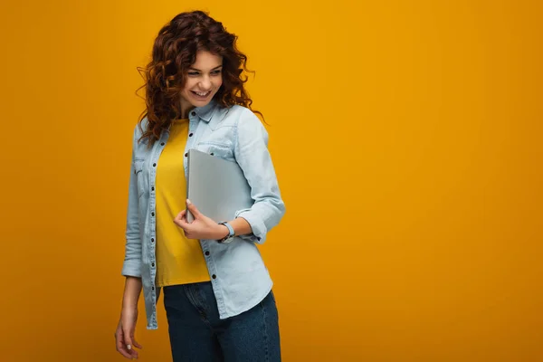 Beautiful Cheerful Redhead Girl Holding Laptop Orange — Stock Photo, Image