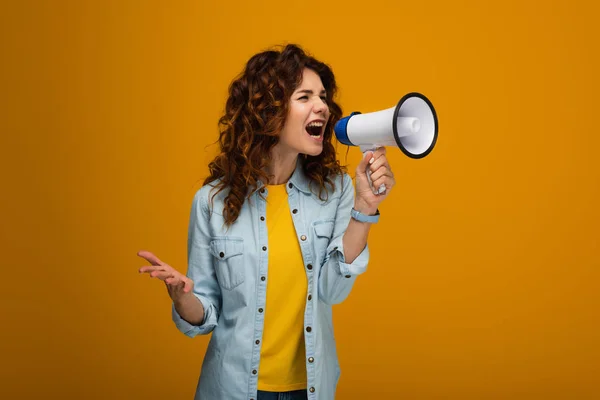 Emotional Curly Redhead Woman Screaming Megaphone Gesturing Orange — Stock Photo, Image