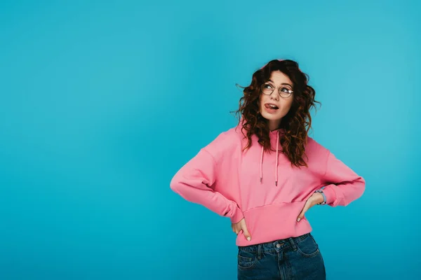 Attractive Curly Girl Standing Hands Hips Showing Tongue Blue — Stock Photo, Image