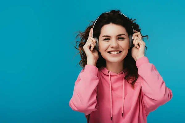 Happy Redhead Girl Looking Camera While Listening Music Headphones Blue — Stock Photo, Image