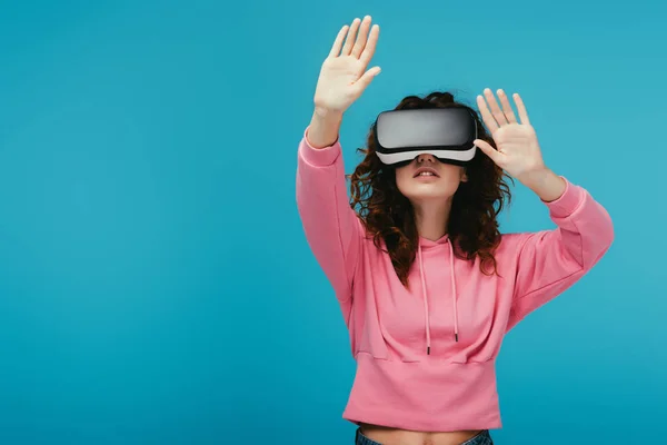 Curly Girl Wearing Virtual Reality Headset While Gesturing Blue — Stock Photo, Image