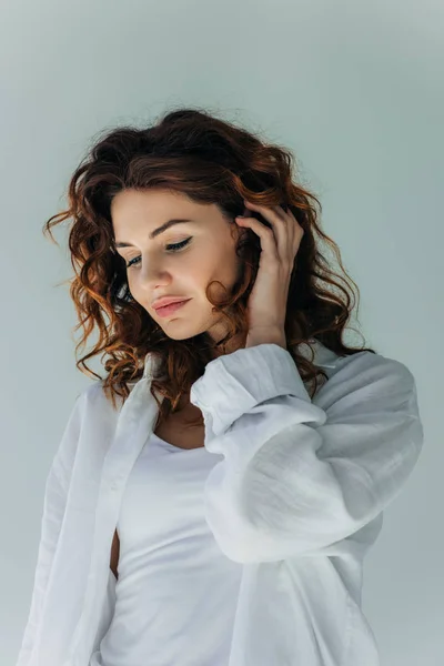 Happy Curly Young Woman Touching Hair Grey — Stock Photo, Image