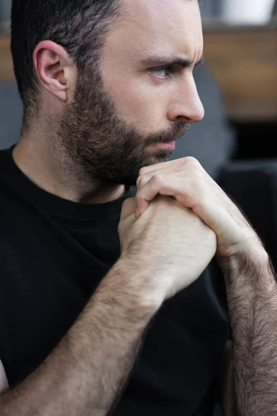 Thoughtful Handsome Unshaven Man Looking Away Looking Hands Face — Stock Photo, Image