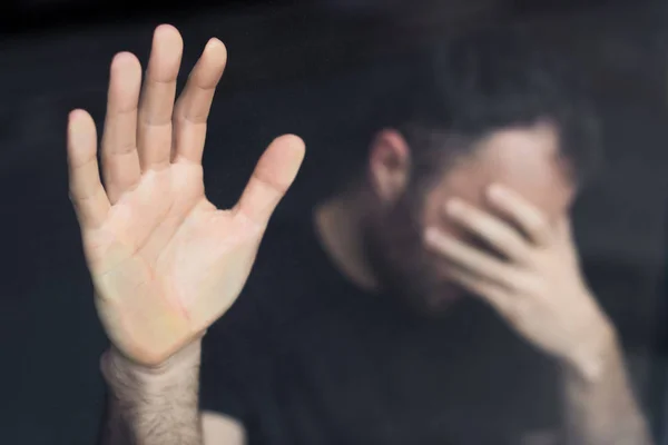 Selective Focus Depressed Man Standing Window Hand Face — Stock Photo, Image