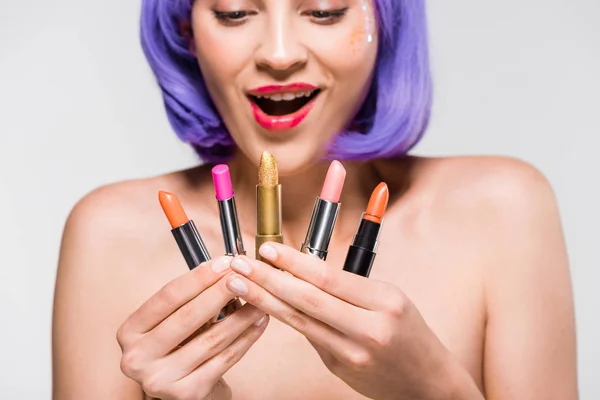 Beautiful Excited Girl Purple Wig Looking Lipsticks Isolated Grey — Stock Photo, Image