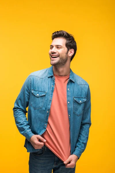 Laughing Good Looking Man Looking Away Isolated Yellow — Stock Photo, Image