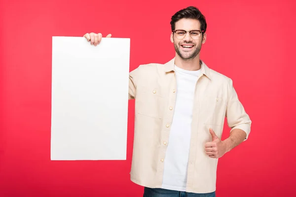 Handsome Man Holding Empty Board Doing Thumb Sign Isolated Pink — Stock Photo, Image