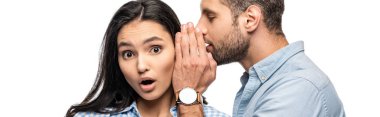 panoramic shot of man telling secret to shocked young woman Isolated On White clipart